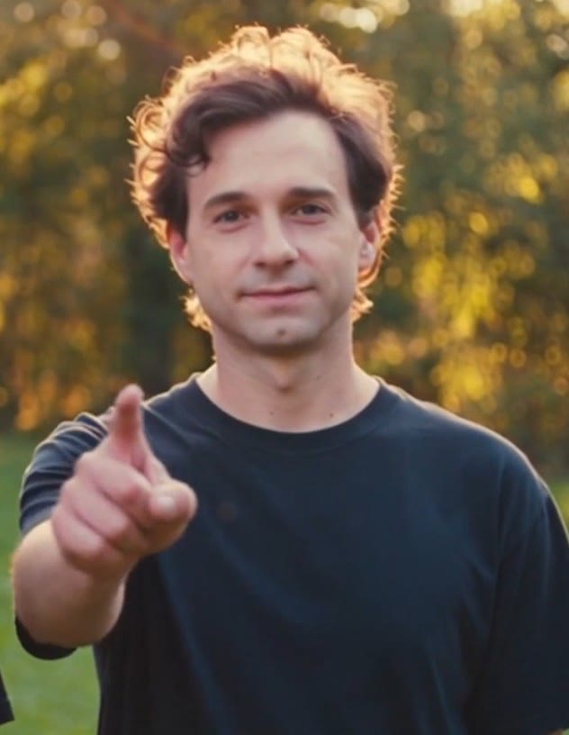Young Mike Warner pointing